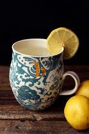 10 Benefits To Drinking Warm Lemon Water Every Morning Www Tasty Yummies Com By Tasty Yummies Via Fl Lemon Water Drinking Warm Lemon Water Warm Lemon Water