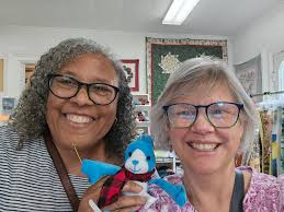 Familiarity with The Grace Company's older wooden quilt frames?