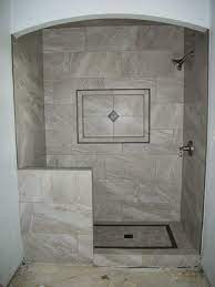 It works well for a taller space, like a shower, to create a vertical and horizontal pattern rather than just one large pattern that can be. Shower With Large Gray Rectangle Tile Traditional Bathroom Houston By N Koehn Tile Houzz Uk