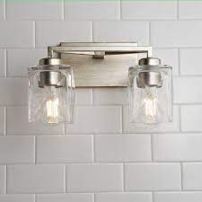 From minimalist vanity light bars with clean lines to more traditional styles with multiple glass shades, there is guaranteed to be a bath light that adds to the modern aesthetic of your bathroom. Faceted Square Glass Vanity Light 2 Light Shades Of Light Glass Vanity Vanity Lighting Rustic Light Fixtures