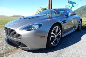 Image result for Titanium Silver 2011 Aston Martin