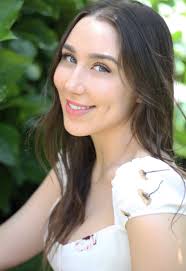 ABOUT — JULIA EDELMAN