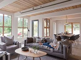 11 Tips To Design A Cozy Scandi Style Cabin Modern Cabin Modern Cabin Interior Contemporary Cabin