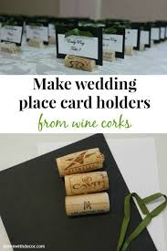 A wedding table place card is a small piece of paper (usually 2.25 inches by 3.5 inches in size) that contains the name and the assigned table number or seat location of a wedding guest. Diy Wedding Place Cards From Wine Corks Green With Decor