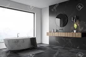 We did not find results for: Corner Of Luxury Bathroom With White And Black Marble Walls Large Window Black Tiled Floor White Marble Bathtub And Wooden Sink With Round Mirror 3d Rendering Stock Photo Picture And Royalty Free
