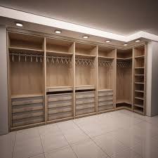 The center section of the wardrobe here also has a proper space for placing the tv in your bedroom. Master Bedroom Closet Design Sleek Modern Dark Wood Closet Ideas For Bachelor Pads Great Master Bedroom Closet Design Bedroom Closet Design Closet Remodel
