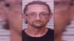 Kidnapping suspect accused of shooting at officers, leading chase taken  into custody