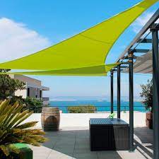 Snow allowed to accumulate on a shade sail. Uv Resistant Shade Sail Toit Terrasse L Atelier Des Voiles Custom Wind Resistant Triangular