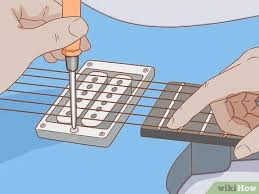 Action itu jarak senar ke fret. 4 Cara Untuk Mengeset Gitar Wikihow