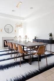Gather around the table with comfortable dining room chairs. See How A Party Stylist Translates Her Cool Girl Style Into Her Home X2 Long Dining Room Tables Dining Room Industrial Bohemian Dining Room