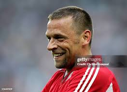 Harald Cerny, Toni Polster and Tony Baffoe carry Thomas Haessler on... News  Photo