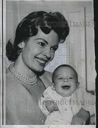 Patricia Owens smiling in swimsuit
