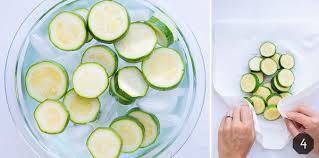 To blanch zucchini, simply bring an unsalted pot of water to a boil. How To Freeze Zucchini Sliced Or Shredded Evolving Table