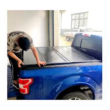 Company has been committed to develop d&p production of pickup, now are: China Factory Price Manufacturer Supplier Hard Tonneau Cover For Ram 1500 For 2015 Ford F 150 Frontier Np300 China Tonneau Cover For Ford F 150 Tonneau Cover For Np300