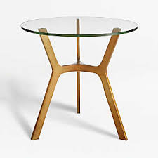 The coffee table is 32.5 in diameter and the end tables are 21.5 wide, so this set can fit in smaller seating areas. Glass End Tables Crate And Barrel