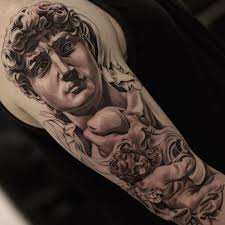 Best Black And Grey Tattoo Artists In The Us Tattoo Artist Jun Cha Black Grey Realistic Tattoo Engraving Usa Jun Cha Tattoo Tattoo Artists Hand Tattoos