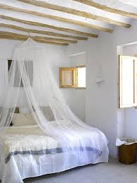 White comfortable pillow on bed decoration interior. A Converted Farmhouse In Grenada Spain Rustic Bedroom Rustic Bedroom Design Bedroom Design Inspiration