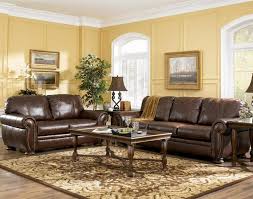 Depending on the colors it is paired with, brown can take on many different moods. Yellow Living Room With Brown Couch Novocom Top