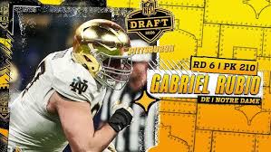 "He's a run stuffer." *** Audio Network reacts in the moment to the pick of DE Gabriel Rubio