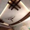 A bedroom ceiling lined with chiseled wooden bars is matchless keep your false ceiling design mesmerising minimalistic. 3