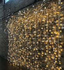 The Incredible Backdrop My Mom Diy D From Tree Branches Fairy Lights Fake Flowers Ribbons And Crysta In 2020 Fake Flowers Fairy Light Backdrops Flower Fairy Lights