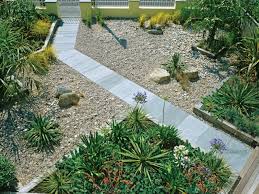 A Slate Path Bisects A Gravel Yard With A Garden That Is Divided Into Quadrants Different Varieties Of Or Outdoor Garden Decor Modern Garden Patio Landscaping