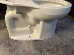 This is a chair height, elongated, 1.28 gallon toilet.i tested how the flush would. K 25224 Highline Tall Two Piece Toilet Kohler