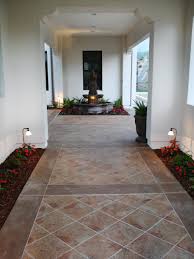 Spanish Courtyard With Flower Beds And Fountain Outdoor Flooring Patio Flooring Patio Tiles