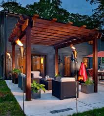 It uses solid teak wood for its posts, beams and trellis, and fixes the wooden posts on a concrete base for a more stable structure. 40 Diy Pergolas You Can Create For Your Own Backyard