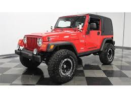 Image result for Flame Red 2006 Jeep