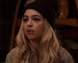 Above moxxie's nightstand in his bedroom is a framed sheet with a domino mask and a rose pictured on it that says. 3pfts40k6gprjm