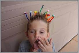 Then, spritz each bun with an orange temporary hair color spray. Top 50 Crazy Hairstyles Ideas For Kids Family Holiday Net Guide To Family Holidays On The Internet Crazy Hair Day At School Wacky Hair Crazy Hair For Kids