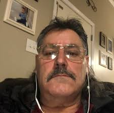 Hornet found with dead yellow jackets in garden hose reel