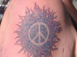 50 awesome peace sign tattoo designs and photos. 24 Relaxed Peace Sign Tattoos For 2013