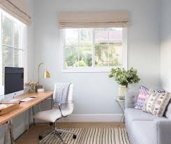 Shop office furniture brands & styles. A Small Yet Clean Home Office With A Wooden Trestle Leg Desk By The Window And A Grey Sofa That Ca Home Office Bedroom Guest Bedroom Office Small Guest Bedroom