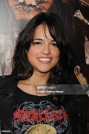 Actress Michelle Rodriguez arrives at the "Machete" Los Angeles... News  Photo