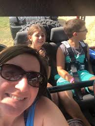 Family photo with jeeps