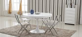 Elle passe de 120 à 160 cm en un clin d'oeil et devient ovale ! Table A Manger Design En Bois Isola
