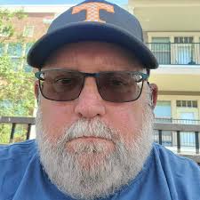 If you could magically acquire the talent to be the best at another sport,  what would it be? And top five songs for your training playlist?