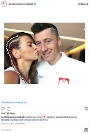 Robert lewandowski and his wife anna, illustration by lovatto. World Cup 2018 Robert Lewandowski S Wife Anna Showers Star In Support Before Poland Game Celebrity News Showbiz Tv Express Co Uk