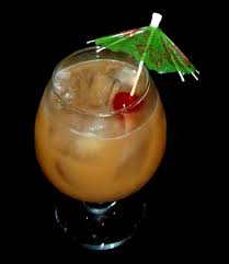 The humble rum punch is one of the party drinks. Cocktail Umbrella Sip Advisor