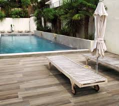 Outdoor tile ideas for patios & decks : Outdoor Pool Patio With Porcelain Tile Floors Contemporary Pool Miami By Simple Steps Houzz
