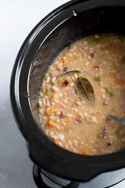 If you like your crock pot pinto beans with ham, based what i've seen in the way of southern pinto beans recipes, i believe you could add a ham hock to the beans as they slow cook. Slow Cooker Ham And Bean Soup Recipe Wholefully