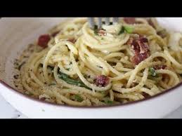 Spaghetti Carbonara Is An Italian Pasta Dish Made With Diced Bacon Creamy Egg Grated Cheese Spaghetti Carbonara Recipe Carbonara Recipe Italian Pasta Dishes