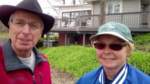 Photographer Victor Banta talks with Joyce Wilde owner of Taming The Wild  gardening services