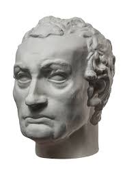 Copia in Gesso Di Un'antica Statua Bianca Di Busto Di Venus Sulla Sedia Con  Una Donna in Gesso Di Fondo Nera Testurizzata Fotografia Stock