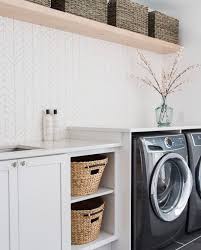 A Laundry Room With Ample Storage Space And Beautiful Chevron Tile Is A Win Win For Me Design B Modern Laundry Rooms Laundry Room Remodel Laundry Room Decor