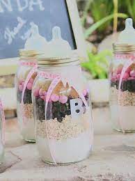 16 Thoughtful Baby Shower Favors To Wow Your Guests Creative Baby Shower Creative Baby Shower Favors Baby Shower Gifts For Guests
