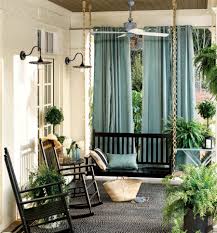 A comfortable living room sofa and additional outdoor furniture gives you feeling of indoor living room right at the porch. 15 Super Simple Back Porch Ideas