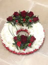 To live in hearts we leave behind / is not to die. Funeral Florist Aylesbury Traditional Funeral Wreath Tribute Flowers Free Delivery By Willow House Flowers Aylesbury Florist